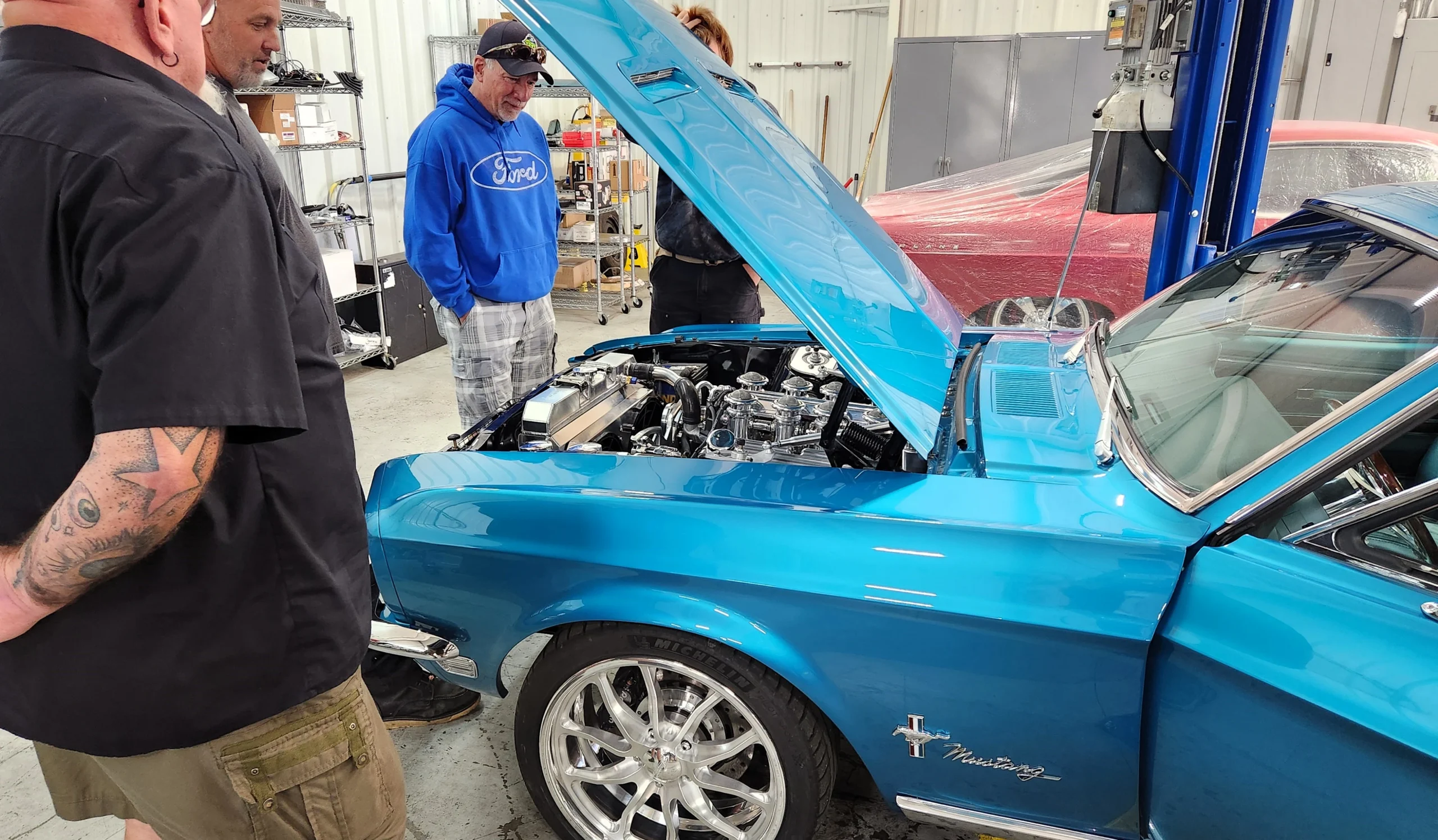 Mechanic working at performance shop