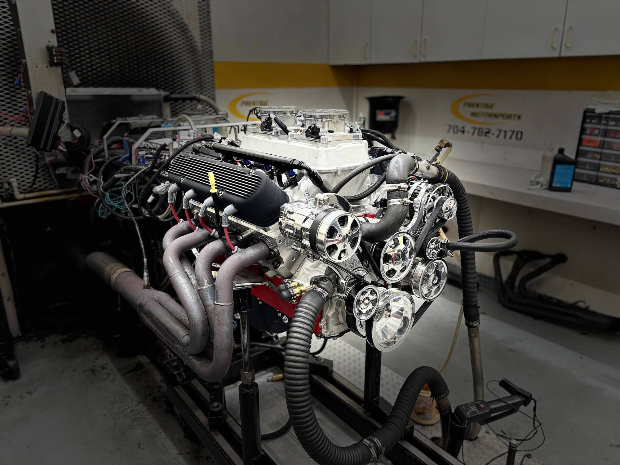 Fuel-injected V8 with polished accessory drive mounted on the Prestige Motorsports dyno