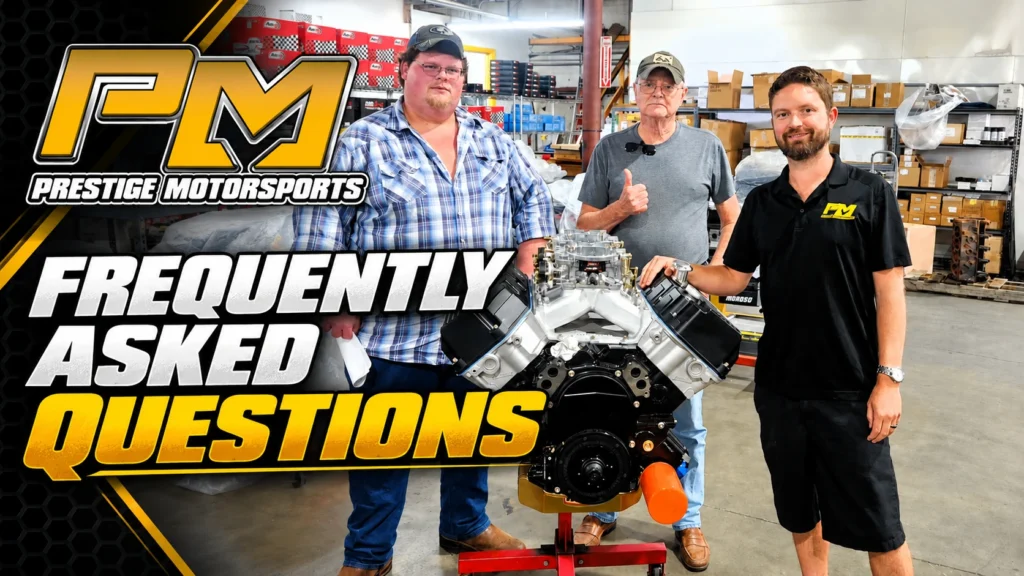 Performance engine FAQs from the Prestige Motorsports team, standing with a crate engine in the shop